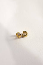 Ezri Crystal Cross Huggie Earrings