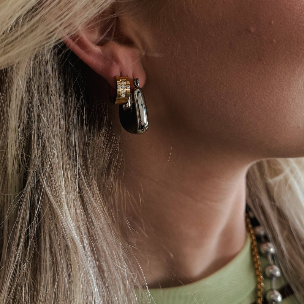 Ezri Crystal Cross Huggie Earrings