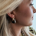 Ezri Crystal Cross Huggie Earrings